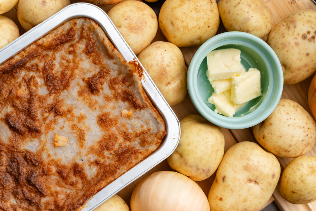 What is Rappie Pie? 4 D'Eon's Rappie Pie with Butter | Photo credit: Adam Bissonnette